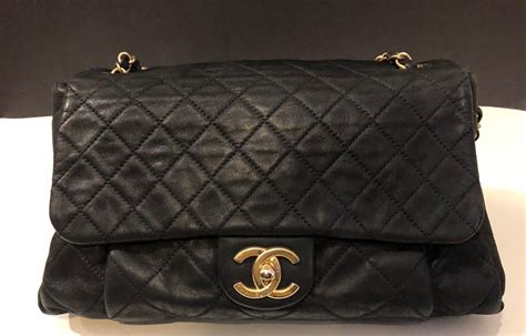 quilted black chanel bag|Chanel quilted reissue shoulder bag.